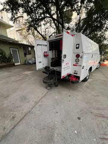 Magnet Plumbing service vehicle on-site for Grease Trap Cleaning in University Hills